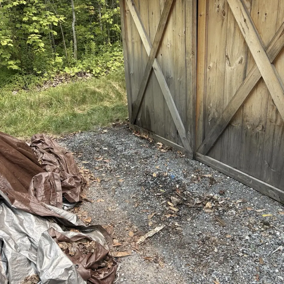 After: The barn door area cleared of lumber